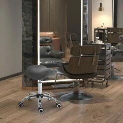 HomCom Ergonomic Rolling Saddle Stool PU Leather Hydraulic Spa Stool Height Adjustable Swivel Drafting Medical Salon Chair